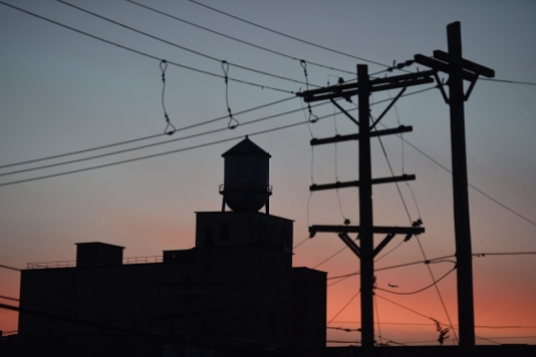 LINCOLN, NEB. - 01/03/2018 - A water tower is silhouetted by the soft colors of a winter sunset Wednesday, Jan. 3, 2018. KAYLA WOLF, Journal Star