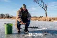 LINCOLN, NEB. - 01/29/2018 - Fedor Petrov waits for fish to bite Monday, Jan. 29, 2018, at Bowling Lake. KAYLA WOLF, Journal Star