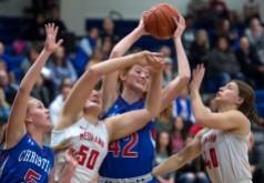 LINCOLN, NEB. - 01/25/2018 - Players from left Barrett Power(5) Megan Spicka (50) Olivia Hollenbeck (42) and Maggie Vasa (40) reach for a rebound Tuesday, Jan. 25, 2018, during the Centennial Conference Semifinals at Lincoln Christian. Bishop Newman defeated Lincoln Christian 47 to 42. KAYLA WOLF, Journal Star