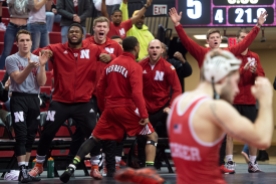 LINCOLN, NEB. - 01/21/2018 - The Nebraska bench erupts with excitement as Tyler Berger wins his match Sunday, Jan. 21, 2018, at the Devaney Sports Center and the Huskers win the meet. Nebraska defeated Rutgers 19 to 13. KAYLA WOLF, Journal Star